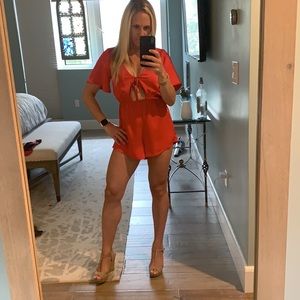 Red, by the way. Romper